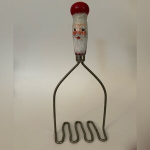 Santa-Themed Vintage Metal Potato Masher